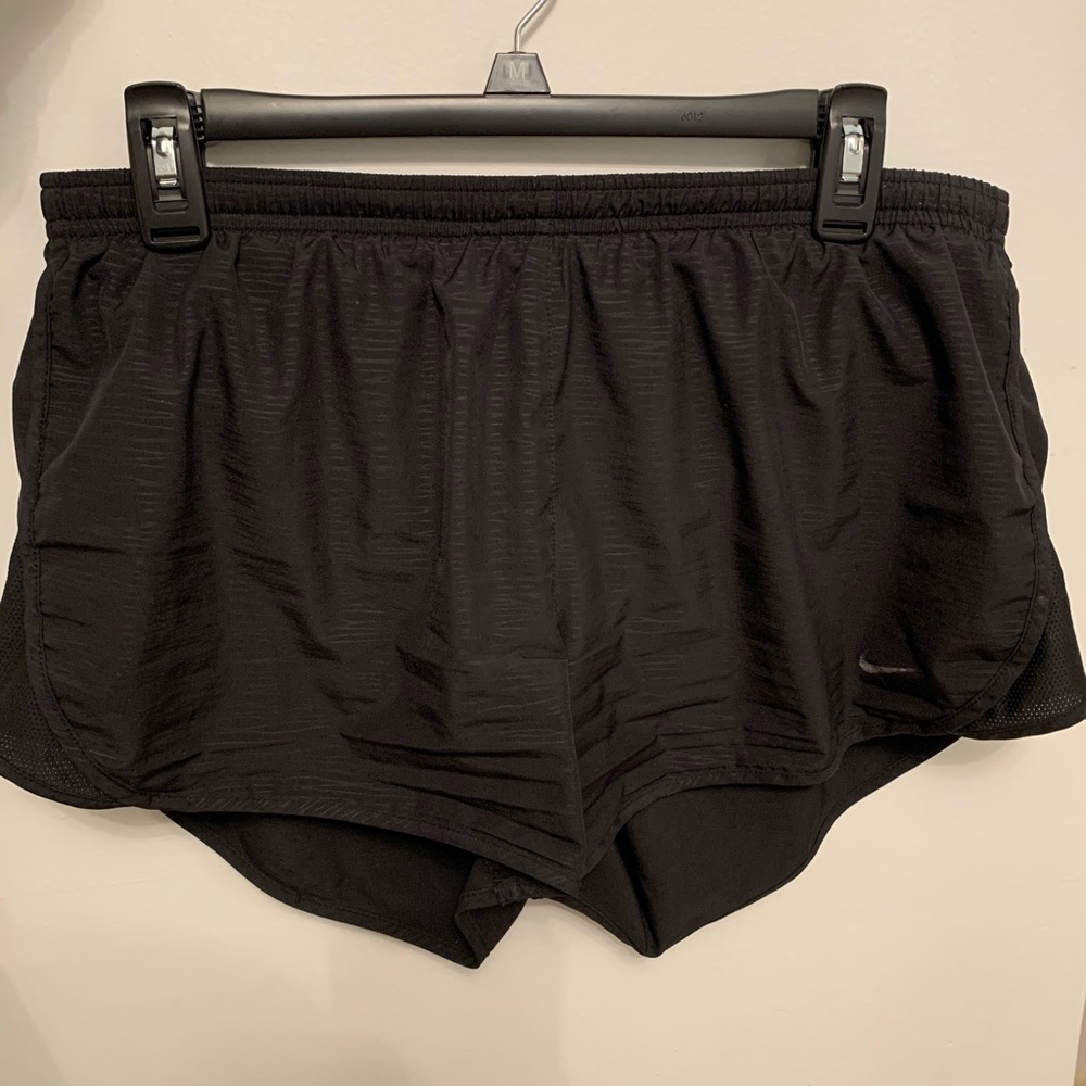 Black Nike running shorts